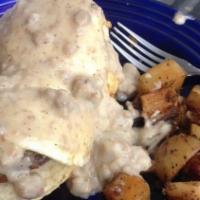 Country Benedict · Two over easy with a choice of meat on a buttermilk biscuit. Covered in our sausage gravy. S...