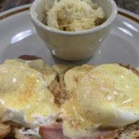 Eggs Benedict · Two poached eggs, country ham, fresh hollandaise, paprika, on toasted English muffin, choice...