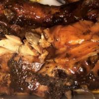 Grilled Jerk Chicken Leq Quarter · This grilled jerk chicken is marinated overnight in a flavorful blend of spices and grilled ...