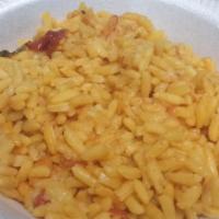 Spanish Rice (Yellow) · Yellow rice is traditional in Spanish, Cuban, Indian and Indonesian ... We add our  little  ...