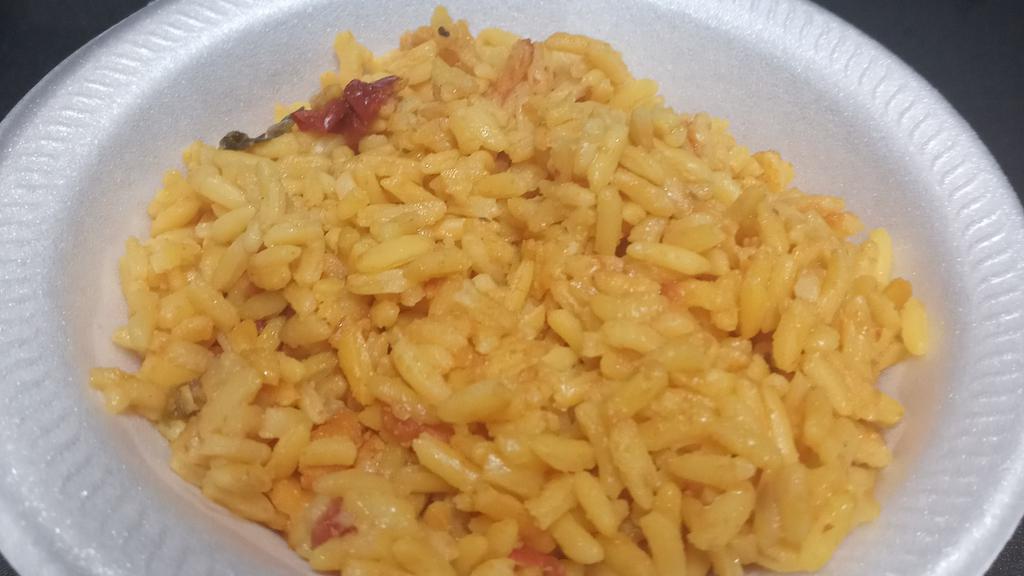 Spanish Rice (Yellow) · Yellow rice is traditional in Spanish, Cuban, Indian and Indonesian ... We add our  little  Cajun style by adding diced onion, red and green bell peppers with chicken.