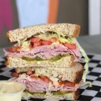 Dad'S Sandwich · Dads will eat anything. Pit smoked Ham and Swiss cheese with dill pickles and lettuce. Dijon...