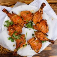 Chicken Tandoori · An Indian favorite! Marinated overnight in yogurt and freshly ground spices, broiled in the ...