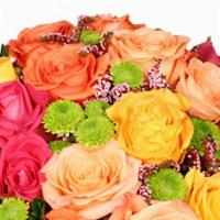 Energetic Roses Arrangement · This vibrant bouquet is sure to liven up their day! The striking mix of brightly colored ros...