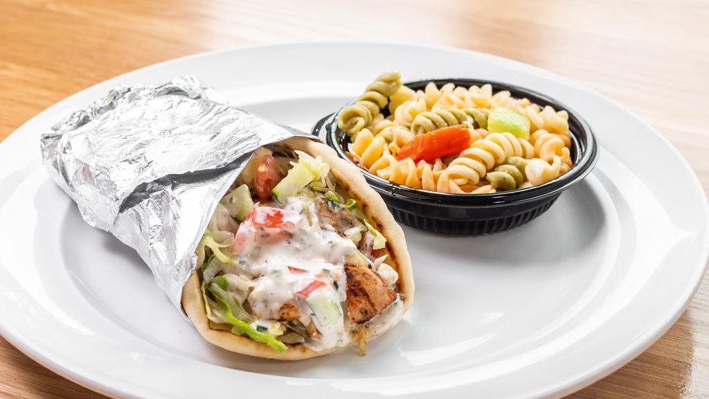 Chicken Gyro · All-natural chicken grilled with Greek seasonings, on a pita with lettuce, tomato, onion, feta cheese, and homemade tzatziki sauce.