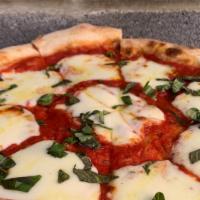 The Maddie Rita · Our red sauce with sliced mozzarella, and fresh basil.