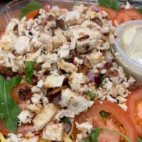 Depot Salad · Spinach, arugula, tomato, red onion, roasted chicken, bacon, bell pepper, and mixed cheese.
