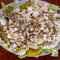 Greek Salad · Lettuce, tomatoes, onions, feta cheese, Kalamata olives and pepperoncini seasoned and dresse...
