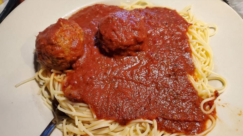 Spaghetti With Meatballs · Served with salad and garlic bread.