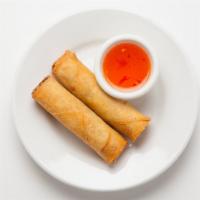 Egg Rolls · Wheat flour rolls filled with chicken, carrots, onions and cabbage and deep fried. (also ava...