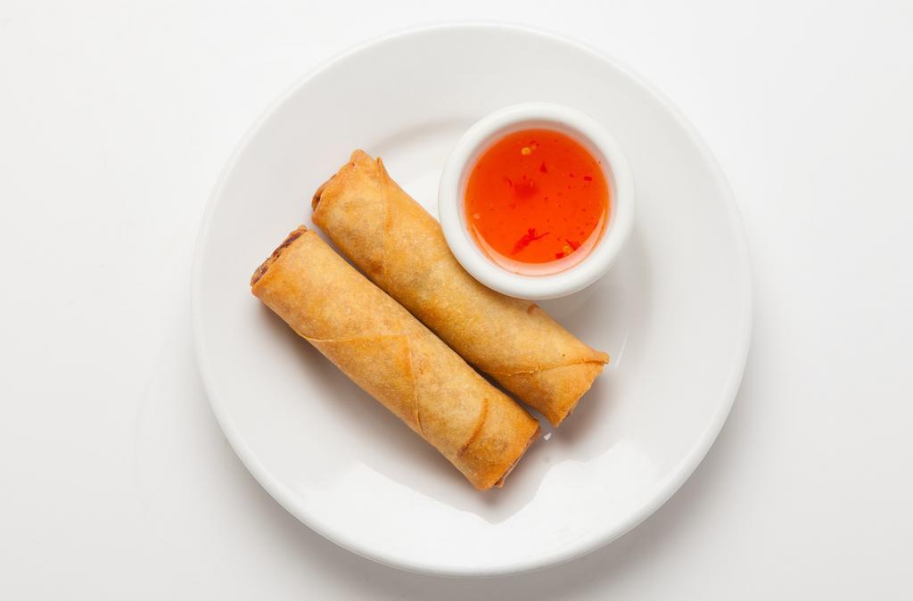 Egg Rolls · Wheat flour rolls filled with chicken, carrots, onions and cabbage and deep fried. (also available with only veggies).