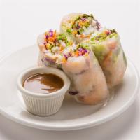 Fresh Rolls · Rice paper stuffed with fresh shrimp, lettuce and mixed vegetables. Served with peanut sauce.