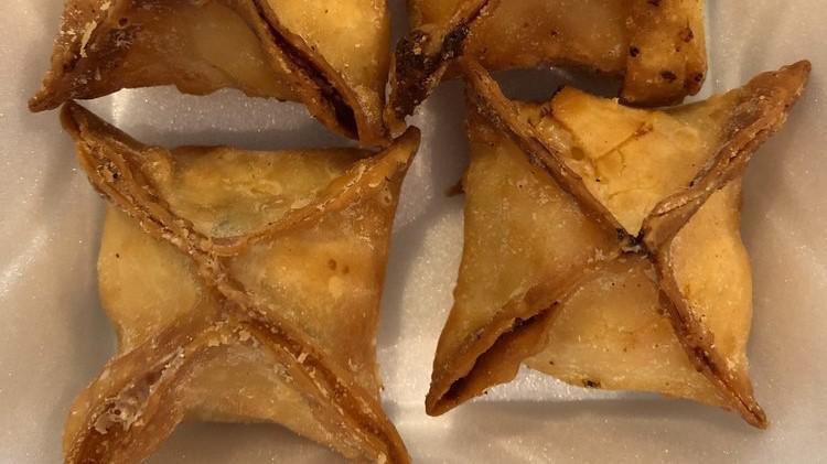 Crab Rangoon · Crab and cream cheese wrapped in wonton skin and deep fried.