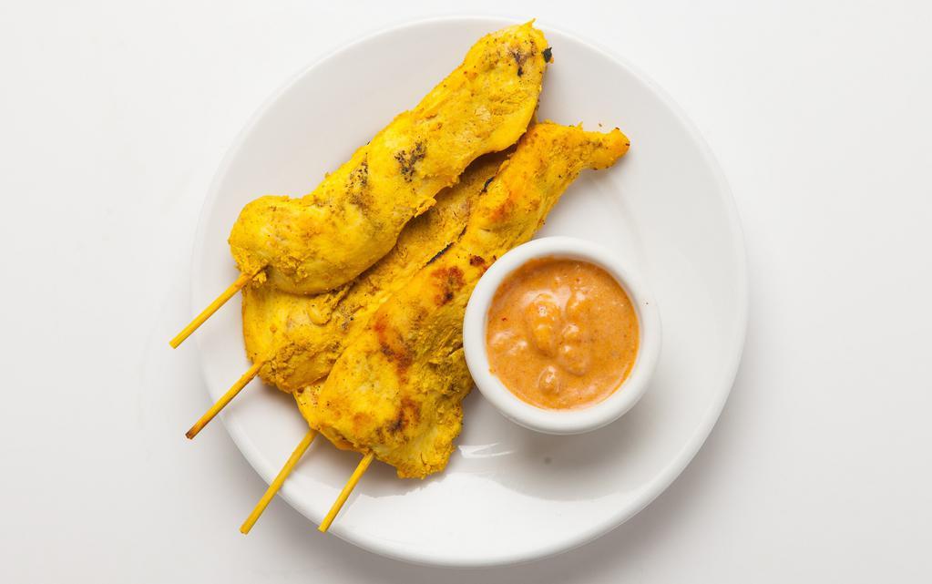 Chicken Satay · Marinated curry chicken grilled and served with curry peanut sauce.