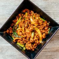 Spicy Pork Bulgogi Box · Thinly sliced pork sautéed with spicy Korean red sauce, onions and scallions on top of white...