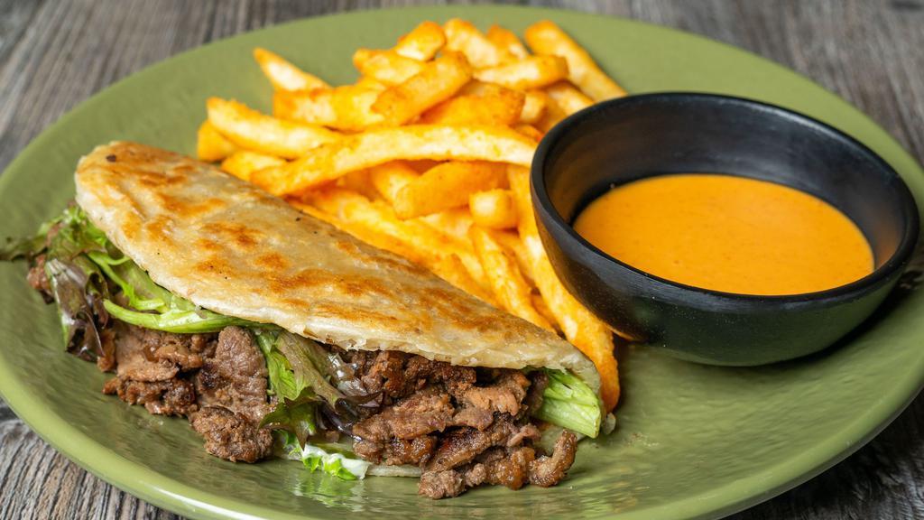 B. Wrap · Choice of beef or spicy pork bulgogi, Korean fried chicken or crispy tofu (Vegetarian) wrapped in a scallion pancake with creamy garden sauce, Asian coleslaw, pickles and mixed greens. Served with b.b. frites.