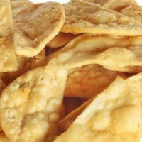 Seasoned Pita Chips · fried pita chips, tossed in a garlic salt and vegetable blended seasoning