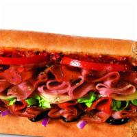 Classic Italian Sandwich · Pepperoni, salami, capicola, ham, mozzarella, black olives, lettuce, tomatoes, onions, and r...