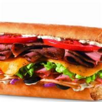 Traditional Sandwich · Black Angus steak, turkey, ham, Cheddar, black olives, lettuce, tomatoes, onions, and ranch.