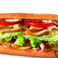Turkey Bacon Guacamole Sandwich · With mozzarella, lettuce, tomatoes, onions, and ranch.