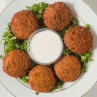 Falafel (Housemade) · Delightful mixture of ground chickpeas, feta, herbs, parsley, onions, herbs and spices shape...