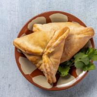 Spinach Pies (2) · Vegetarian. Stuffed with spinach, onions & sumac.