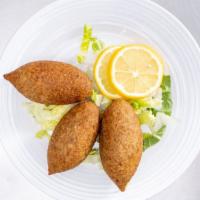 Handmade Kibbeh · Cracked wheat shell, stuffed with lean ground beef, onion & spices.