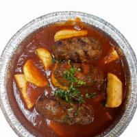 Baked Kafta & Tomato · Kafta Kabobs grilled, mixed with potatoes, then dunked and baked in tomato sauce spices and ...