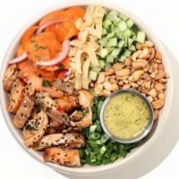 Thai Chicken Crunch · kale, shaved brussels, cabbage, mixed greens, pickled carrots, cucumbers, cashews, Thai chil...