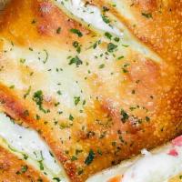 Calzone · Mozzarella cheese and ham, plus one ingredient of your choice and ricotta on request at no e...