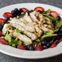 White Balsamic And Berry Caramel Salad · Spring mix, blueberries, strawberries, sugar-roasted pecans and herbed Boursin cheese, finis...