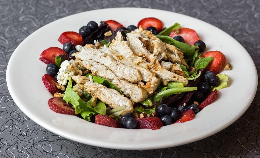White Balsamic And Berry Caramel Salad · Spring mix, blueberries, strawberries, sugar-roasted pecans and herbed Boursin cheese, finished with a white balsamic and caramel dressing.