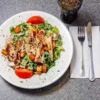Grilled Chicken Caesar Salad · Romaine, Parmesan and Jack cheese, mushrooms, tomato, olive salad, croutons and our famous C...