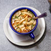 South Of The Border Soup · Made from chicken and beef stock with loads of all-white-meat chicken, peppers, tomatoes, on...