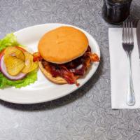 Bbq Bacon Cheddar Burger · Topped with crispy bacon, BBQ sauce and cheddar cheese.