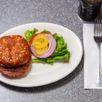 Beyond Meat Burger · Beyond meat plant-based burger patty served on a wheat bun. vegan.