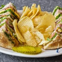 The Best Smoke Club Sandwich · Triple-decker with smoked turkey, bacon, ham, cheddar cheese, hard-boiled egg, tomato, lettu...