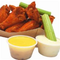 8 Hot Wings · Mix of Flats and Drums, Deep-Fried to Perfection then dipped in your favorite sauce!