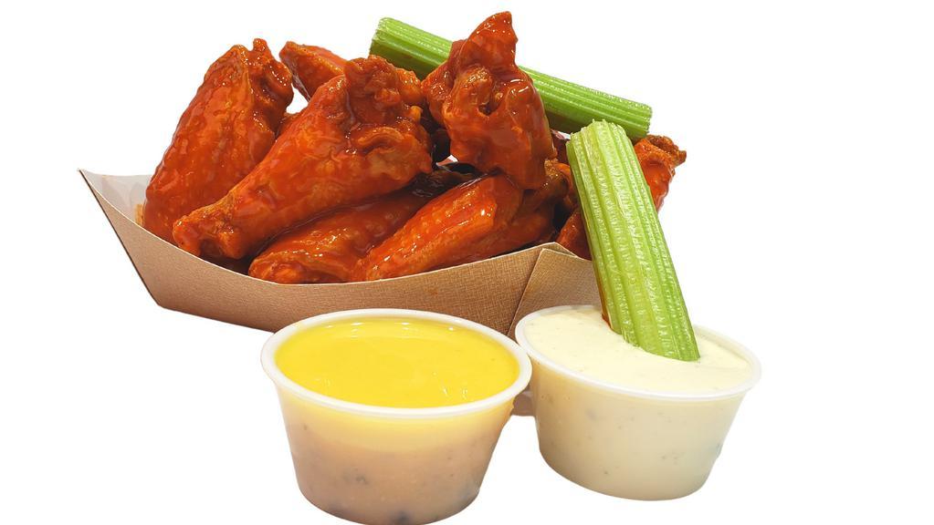8 Hot Wings · Mix of Flats and Drums, Deep-Fried to Perfection then dipped in your favorite sauce!
