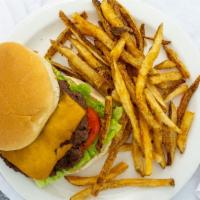 Cheeseburger · Fresh ground beef seasoned and grilled, topped with choice of cheese, lettuce, tomato and re...