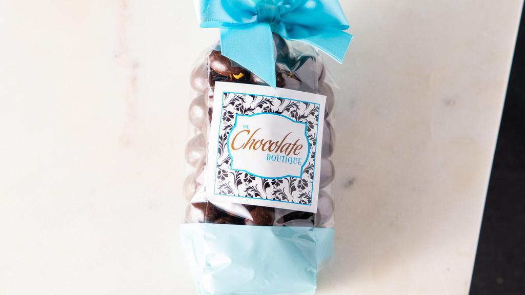 Dark Chocolate Coconut Almonds · Toasted almonds covered in coconut and dark chocolate. One of our customer favorites!