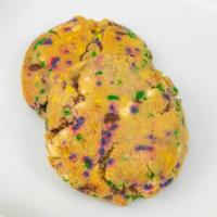 Fat Tuesday Deluxe Cookie · Our signature dough complimented with festive sprinkles and premium chocolate chunks and tof...