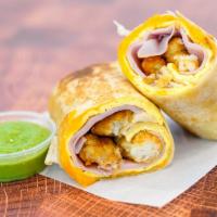 Ham, Egg, And Cheddar Breakfast Burrito · 3 fresh cracked cage-free scrambled eggs, melted Cheddar cheese, ham, crispy potato tots wra...