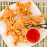 Crab Rangoon(6) · Hand folding wonton wrappers filled with crab meat& cream cheese, deep fried to golden brown...