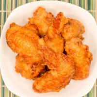 Fried Chicken Wing(6) · Tender chicken wings marinated in ginger, garlic, light seasonings, fried to a golden brown,...
