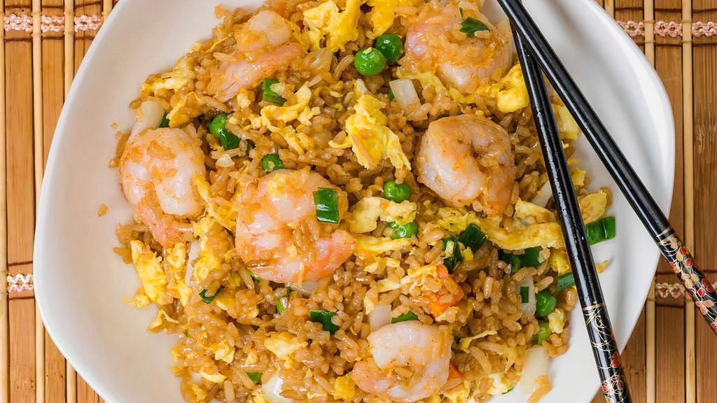 Shrimp Fried Rice (Qt) · Wok tossed fried rice with  shrimp, egg, bean sprouts, yellow onions, peas& carrots, green onions in our special blend of spices.