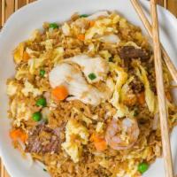 House Fried Rice (Qt) · Wok tossed fried rice with combination of shrimp, beef, chicken, egg, peas& carrots, yellow ...