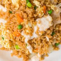 Chicken Fried Rice (Qt) · Wok tossed fried rice with tender white meat chicken, egg, bean sprouts, yellow onions, peas...