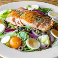 Salmon Salad · Fresh salmon on top of fresh greens with capers, red onions, black olives, and sliced boiled...