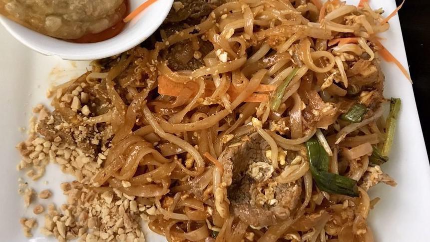 Pad Thai · Rice noodle, egg, bean sprout, and green onion in a pad Thai sauce topped with ground peanut.